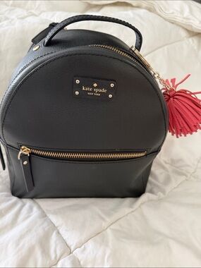 kate spade Black Leather Mini Backpack with Pink Tassel Charm